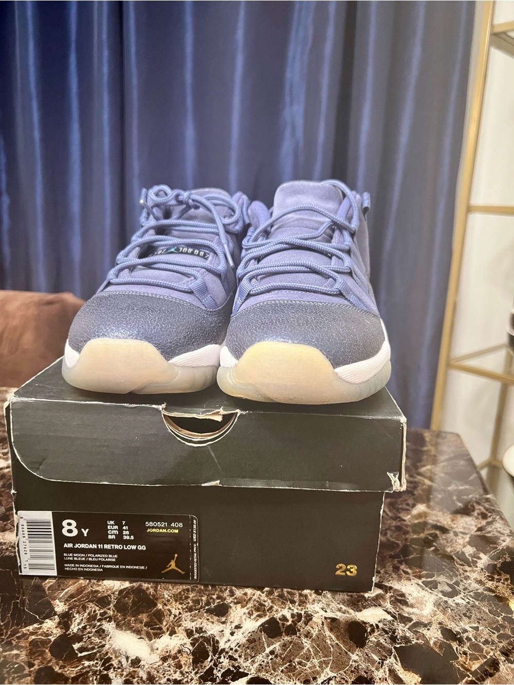 Jordan Retro Low Women’s Sneakers in polarized blue.